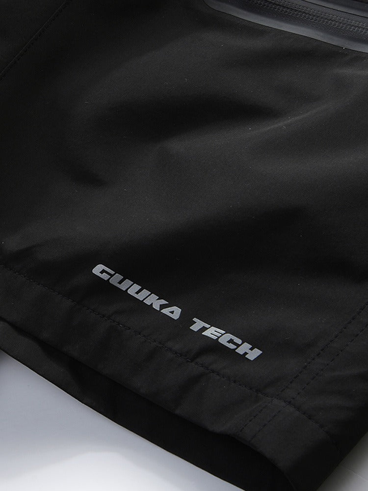 Black cargo shorts with belt loops and a drawstring closure for a customizable fit.