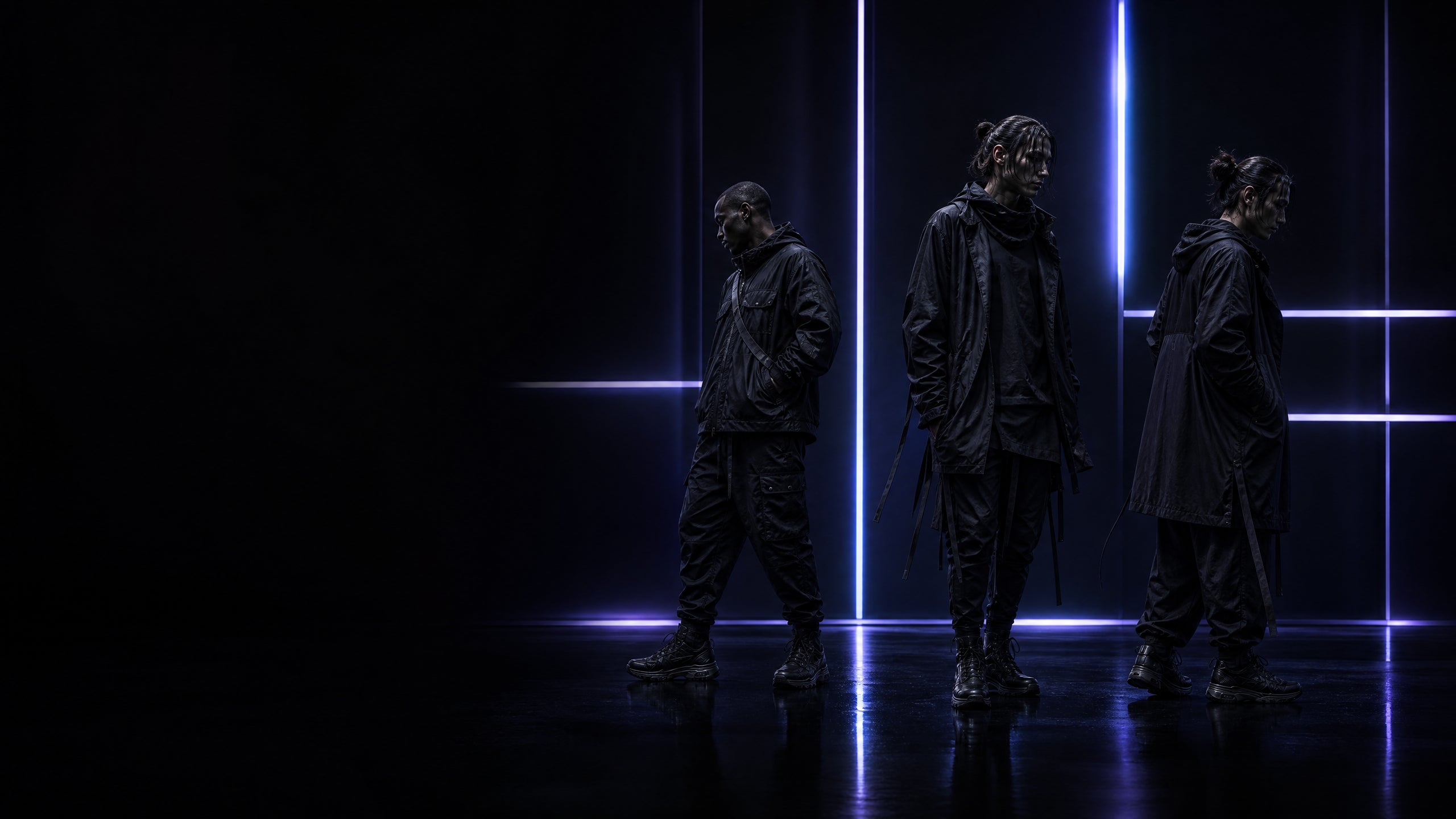 Three different black techwear silhouettes in an ultraviolet architectural studio, showing distinct fit proportions