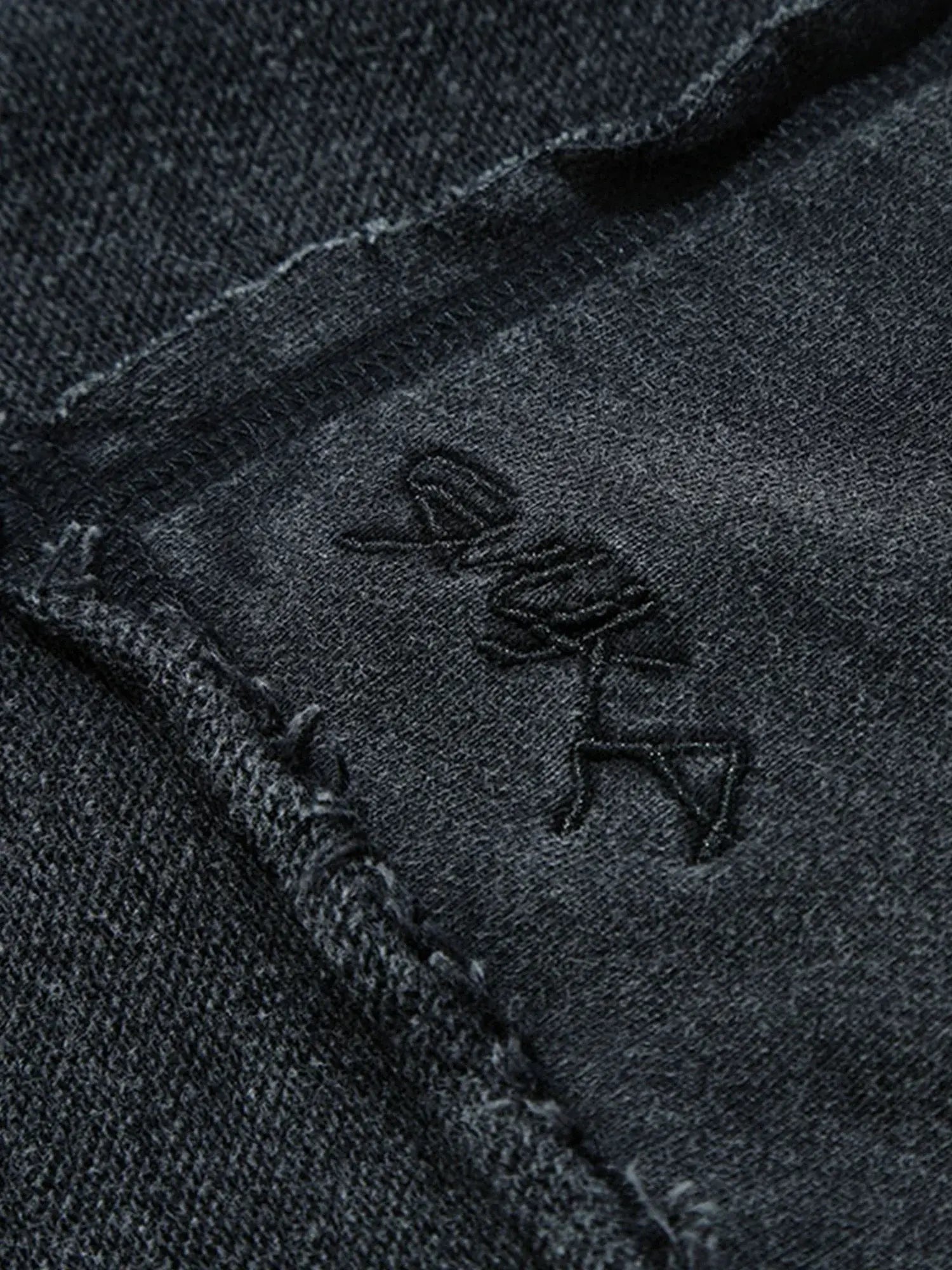 Soft black knit fabric crafted into relaxed-fit summer shorts. Trendy: Elevate your summer look with these black, oversized knit shorts. The latest trend in comfortable style.