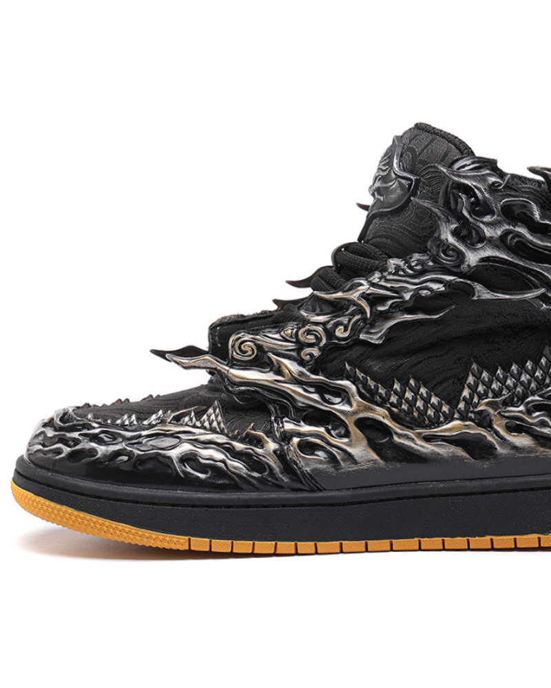 Black and silver high-top sneaker with intricate design on a white background
