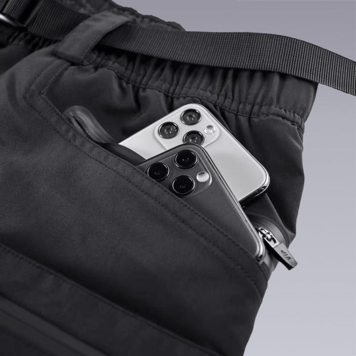 Clotechnow Multi-Pocket techwear Pants are perfect if you are looking for a budget-friendly pair of tactical pants. These shorts have six pockets total, two of which are on the side while another couple of pockets are on the butt area. This pair of tactical pants also come with a removable webbing belt and have a zipper pocket which closes tight at the top. These pants are machine washable and can be dried using the tumble dryer. If you are looking for tactical pants, this one is perfect.