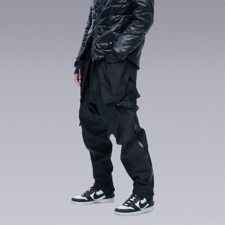 Men standing wearing techwear pants overalls