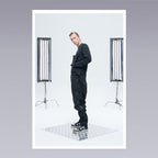 Men standing wearing techwear pants overalls
