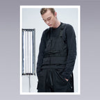 Men standing wearing techwear pants overalls