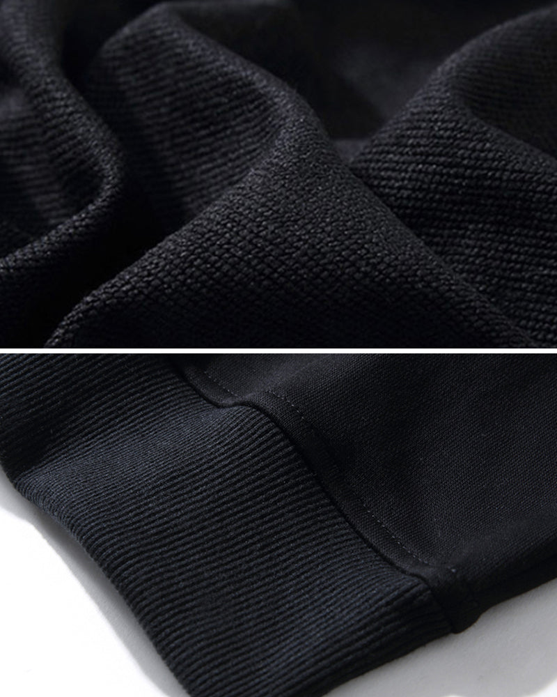 Close-up of black fabric texture with a white background