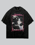 A black mineral-wash graphic t-shirt featuring a stylized anime character print with pink gothic text reading 'MEMENTO' and 'DON'T WORRY'.