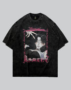 A black mineral-wash graphic t-shirt featuring a stylized anime character print with pink gothic text reading 'MEMENTO' and 'DON'T WORRY'.