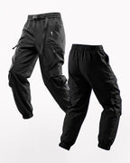 Black tactical pants on a white background