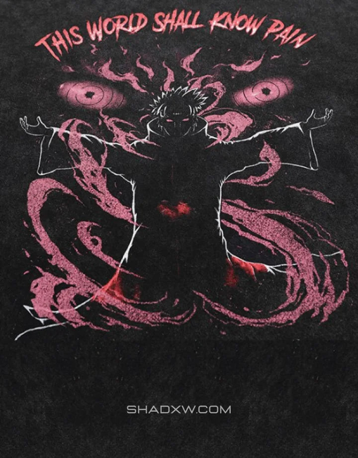 A black graphic print featuring a stylized anime character with arms outstretched, surrounded by swirling pink energy and the text 'THIS WORLD SHALL KNOW PAIN' in pink at the top. The watermark 'SHADXW.