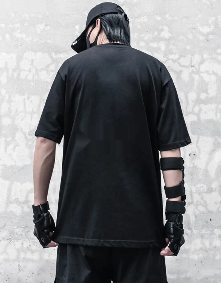 Tactical-style short-sleeve techwear shirt with pronounced front pockets and panel detailing for an urban utility aesthetic — view 4