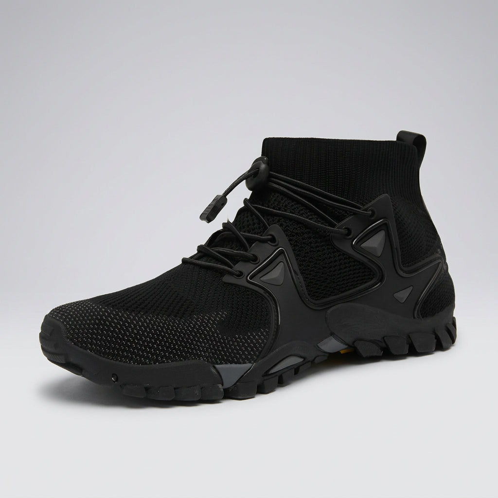 A black high-top athletic sneaker with a knit sock-like collar, lace-up front, and rugged sole, shown on a light gray studio background.