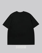 Dual-tone black and white techwear t-shirt with bold chest emblem and clean panel design for modern street layering — view 5