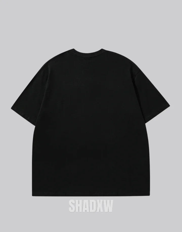 Dual-tone black and white techwear t-shirt with bold chest emblem and clean panel design for modern street layering — view 5