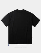 Oversized graphic techwear tee featuring a bold masked emblem and anti-conformist street style cues in contrasting tones — view 2