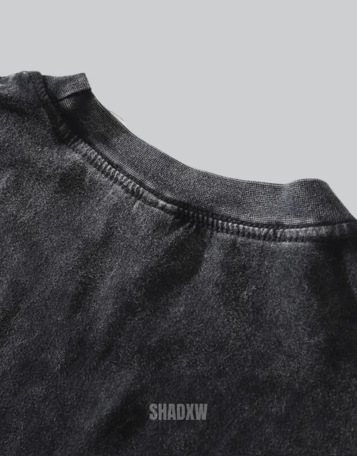 Oversized techwear t-shirt with distressed barbed-wire graphic, muted industrial palette and unisex streetwear styling — view 5