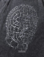 Oversized techwear t-shirt with distressed barbed-wire graphic, muted industrial palette and unisex streetwear styling — view 2