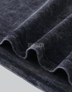 Asymmetric oversized techwear t-shirt with dark bold graphics, uneven hem detail, and gritty urban styling cues — view 5