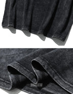 Oversized washed black techwear t-shirt with a long hem, muted charcoal finish, and minimalist urban streetwear styling — view 9