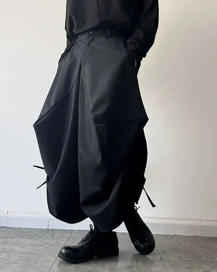 Clotechnow black baggy hakama pants with a wide-leg draped silhouette and techwear aesthetic