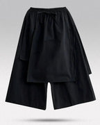 Clotechnow black double-layer wide-leg hakama pants with an elastic drawstring waist and draped layered design.