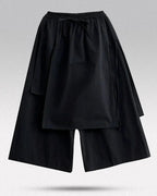 Clotechnow black double-layer wide-leg hakama pants with an elastic drawstring waist and draped layered design.