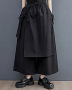 Clotechnow black double-layer hakama pants with a wide-leg silhouette, drawstring waist, and side tie details.