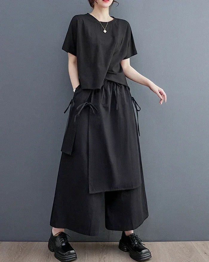 Clotechnow black double-layer Muse hakama pants with a wide-leg silhouette and side tie details on a model