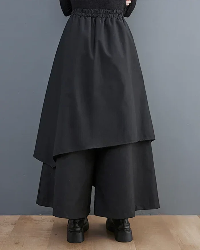 Clotechnow black formal drape hakama pants with a wide-leg silhouette and layered fabric detail