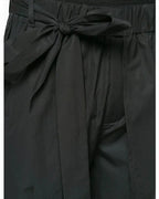 Clotechnow black short-length hakama pants featuring a wide-leg silhouette and a tied waist detail.