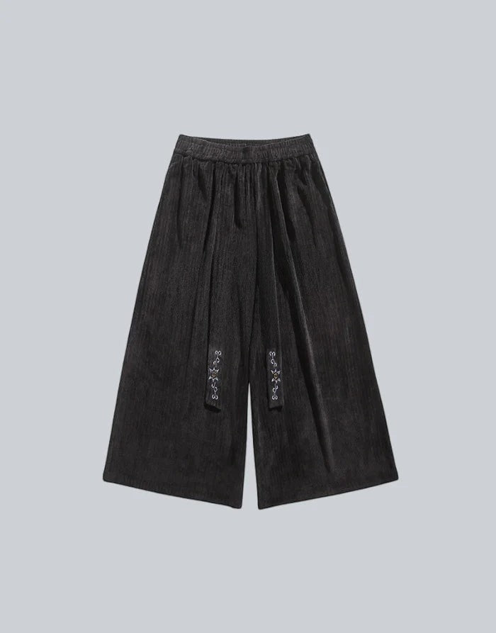 Clotechnow black Harajuku volume hakama pants with wide-leg silhouette and decorative embroidery on front ties