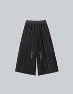 Clotechnow black Harajuku volume hakama pants with wide-leg silhouette and decorative embroidery on front ties
