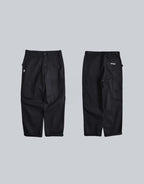 Clotechnow black multi-utility hakama pants shown from front and back views with a wide-leg streetwear silhouette.