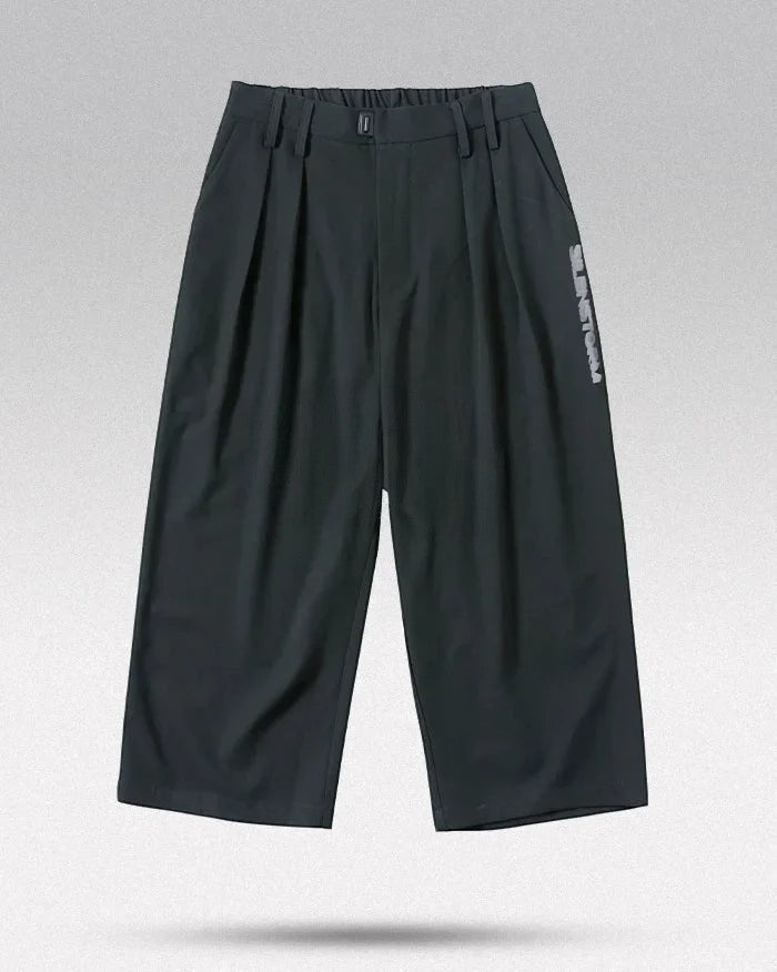 Clotechnow Ninja Motion Hakama pants in black with a wide-leg silhouette, pleated front, and side text detail.