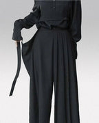 Clotechnow Fluid Line Hakama Pants in black with a wide-leg draped silhouette and side tie detail