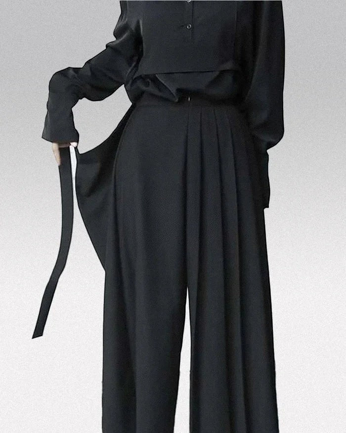 Clotechnow Fluid Line Hakama Pants in black with a wide-leg draped silhouette and side tie detail