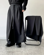 Clotechnow black modular skirted hakama pants featuring a layered hybrid silhouette and waist tie detail
