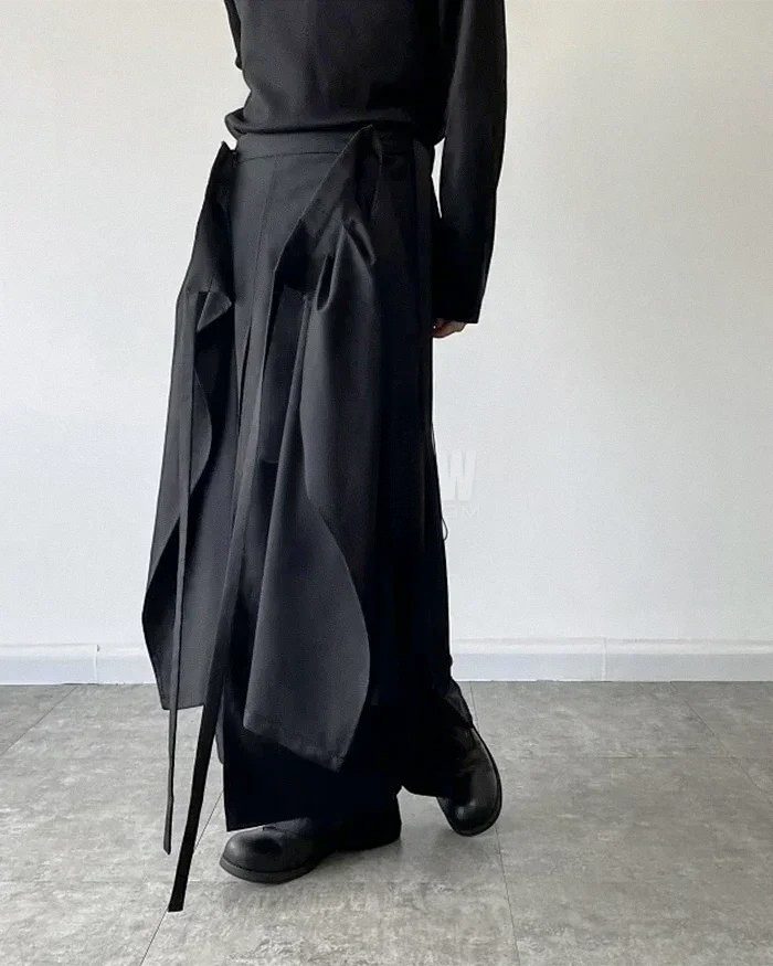 Clotechnow black modular skirted hakama pants with layered fabric panels and wide-leg silhouette for streetwear style