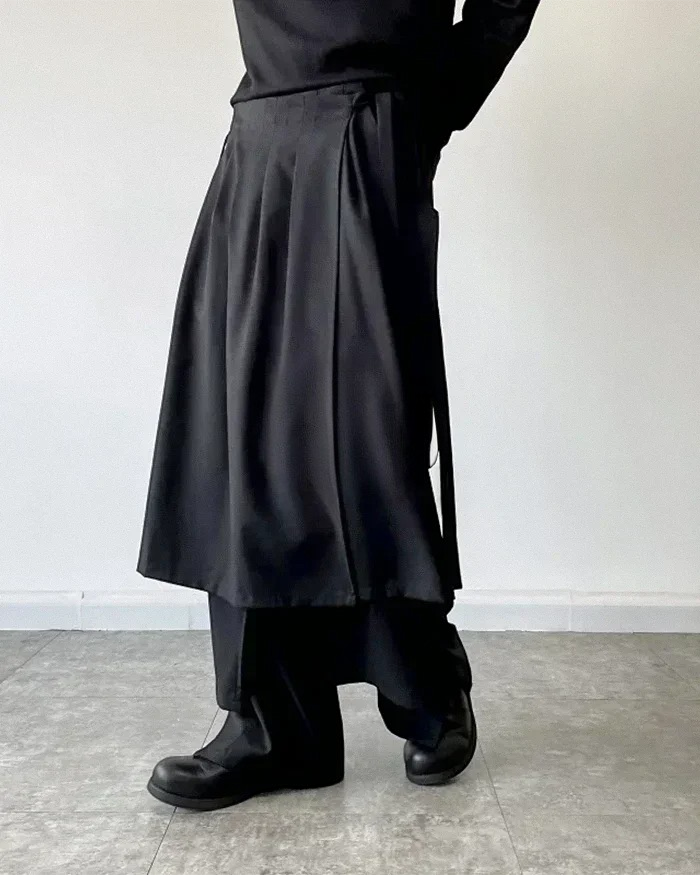 Clotechnow black modular skirted hakama pants with a layered hybrid silhouette and pleated skirt overlay