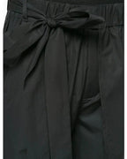 Clotechnow black short-length hakama pants featuring a wide-leg silhouette and an adjustable tie-waist detail.