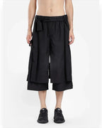 Clotechnow black short-length hakama pants with a wide-leg draped silhouette and adjustable waist tie