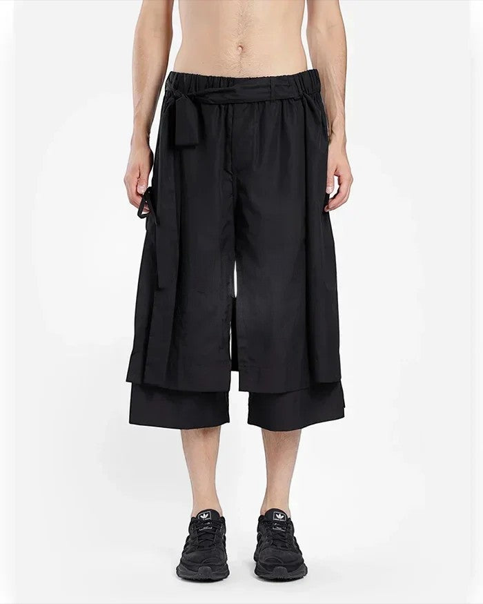 Clotechnow black short-length hakama pants with a wide-leg draped silhouette and adjustable waist tie