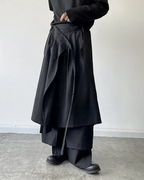 Clotechnow modular black skirted hakama pants with layered fabric construction and wide-leg silhouette.