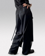 Clotechnow black modular skirted hakama pants featuring a layered hybrid silhouette and elastic waistband