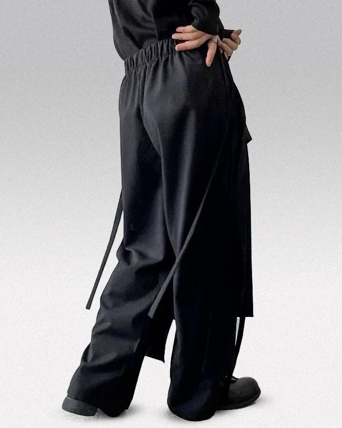 Clotechnow black modular skirted hakama pants featuring a layered hybrid silhouette and elastic waistband