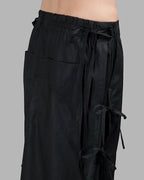 Clotechnow black taper cuff hakama pants with drawstring waist and side tie details in a wide-leg streetwear style