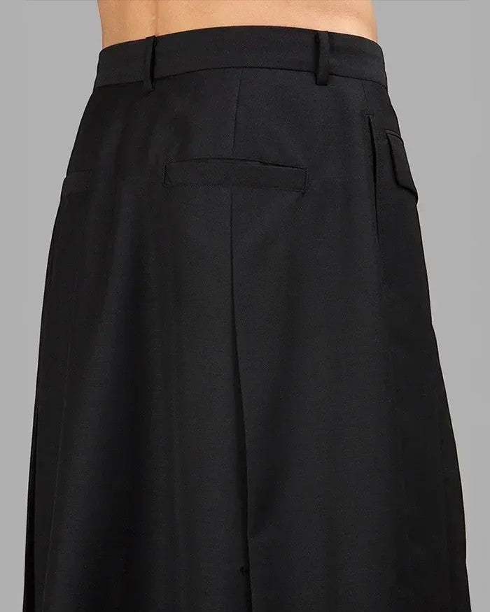 Clotechnow black wide-leg Night Utility Hakama pants featuring a clean draped silhouette and back pocket detail.