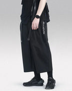 Clotechnow Ninja Motion black wide-leg hakama pants with techwear detailing and side text print