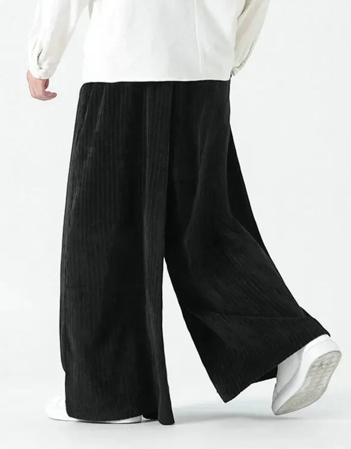 Clotechnow Harajuku volume hakama pants in black featuring a wide-leg draped silhouette and textured fabric.