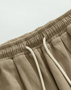 Clotechnow brown plush layer hakama pants featuring an elasticated waistband with white drawstring detail