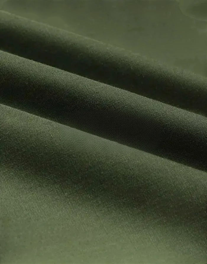 Close-up of forest green fabric texture from Clotechnow Forest Tone Hakama Pants showing draped folds